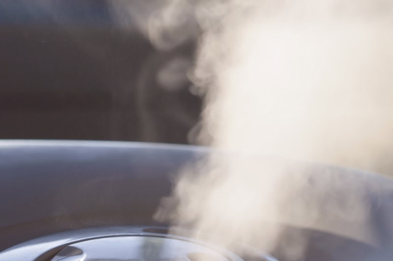 The Benefits of Multi-Stage Humidity Control for IAQ. A humidifier putting out mist.